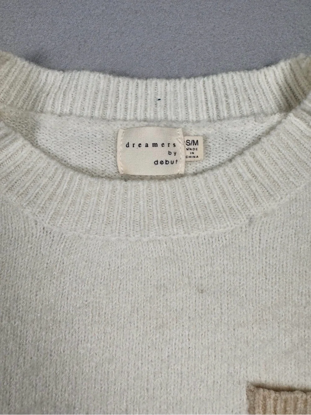 Dreamers Cream Knit Crewneck Sweater with jeans sleeves and Beige Pocket Accent